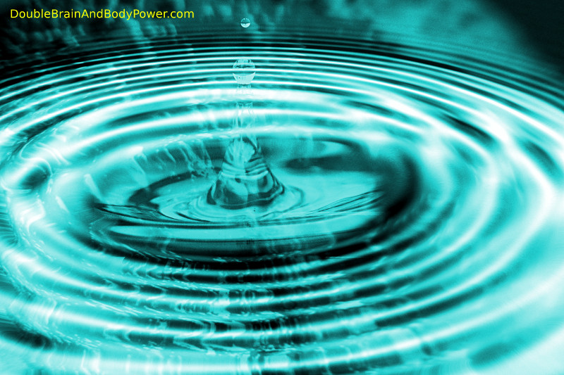 Picture of waves rippling in concentric circles from a center point in blue water.